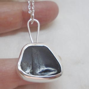 Whitby Jet in a sterling silver handmade surround. Hallmarked silver and Whitby Jet pendant