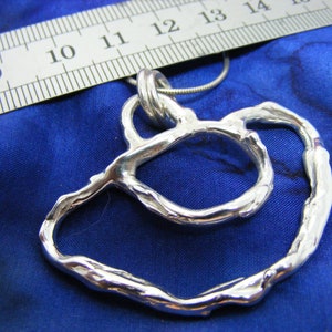 Fluidity Silver Glasses holder, handmade, hallmarked textured silver jewellery