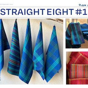 May include: Five blue and green plaid kitchen towels hanging on a white wall. The towels are woven with a plain weave pattern. The towels are labelled "Straight Eight #1".