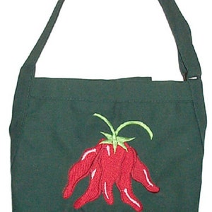 May include: A dark green apron with a red chili pepper design and the name "Melinda" embroidered in red.
