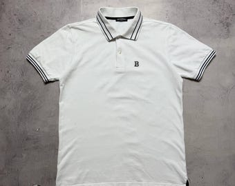Polo Balmain Paris con logo bordado, piqué blanco de lujo, talla S para hombre.