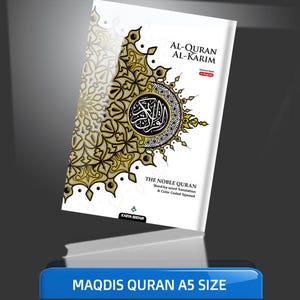 May include: A white and gold Quran with the title "Al-Quran Al-Karim" and the text "The Noble Quran Word-by-word Translation & Color Coded Tajweed" on the cover. The book is in an A5 size.