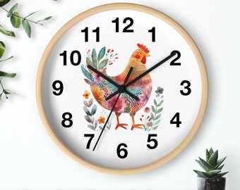 May include: A white clock with black numbers and hands, featuring a colorful illustration of a chicken surrounded by flowers. The clock has a wooden frame.