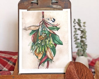 May include: A watercolor painting of a sprig of mistletoe with a small bird perched on top. The mistletoe is tied with a red ribbon and surrounded by green leaves. The painting is framed and displayed on a wooden easel.