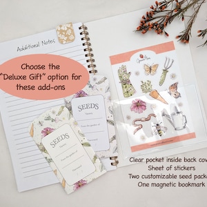 wire-bound notebook opened on white background with two illustrated seed packets and sheet of garden-themed, watercolor-style stickers in pastel colors and floral magnetic bookmark. Overlay text reads "choose the deluxe gift option for these add-ons