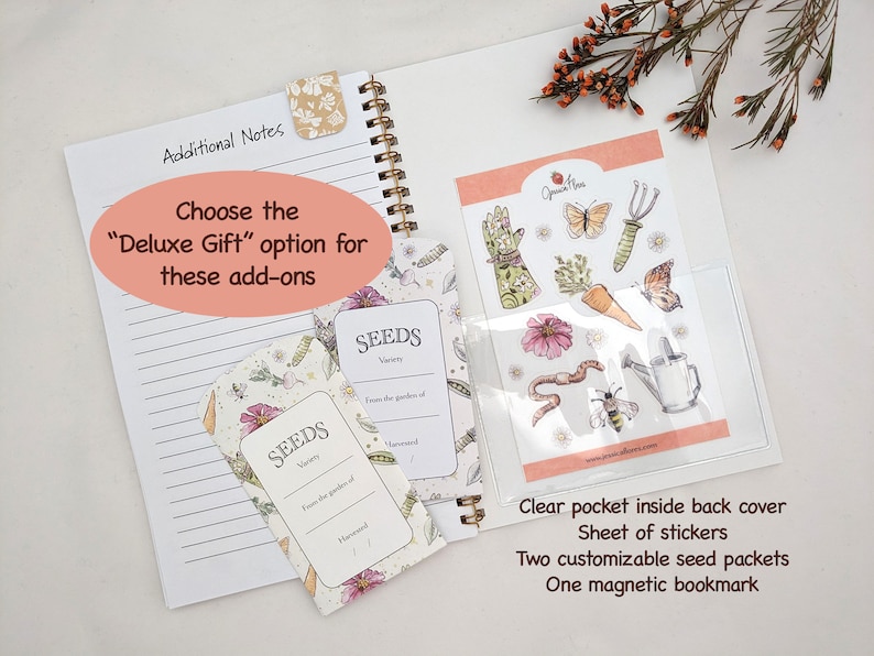 wire-bound notebook opened on white background with two illustrated seed packets and sheet of garden-themed, watercolor-style stickers in pastel colors and floral magnetic bookmark. Overlay text reads "choose the deluxe gift option for these add-ons