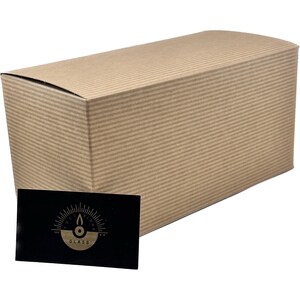 A cardboard box and a business card are shown in the image.