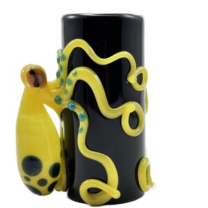 Octopus Shot Glass. Collectible Hand Blown Black 1 oz jar with Flamework Yellow Octopi and detailed . Made to order.