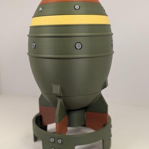 Fallout Mini-Nuke Storage Containers: Desk Prop for Gamers and Sci-Fi Enthusiasts. Bonus glow in the dark sign! Available in 2 sizes.