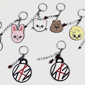 Stray Kids SKZOO Keychain Set: 10-Pack Collection with 8 Member Characters and 2 Logo Designs