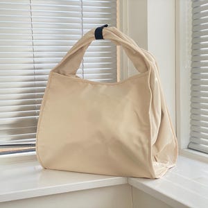 Nylon tas | Draagtas | Schoudertas | Reistas | Mamatas | Luiertas | Sporttas | Outdoortas | Crossbodytas | Multifunctioneel | Waterdicht