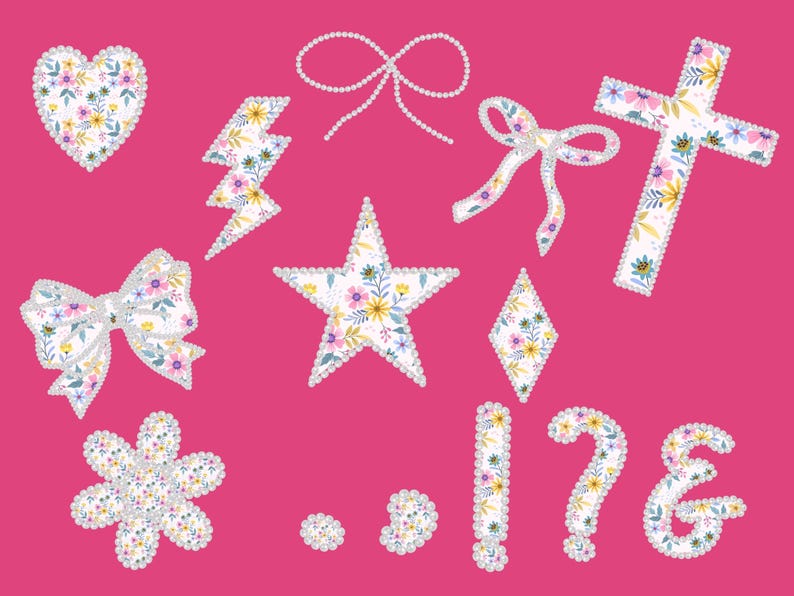 May include: A collection of floral-patterned embellishments on a pink background. The designs include a heart, lightning bolt, star, bow, cross, flower, diamond, punctuation marks, and a bow made of pearls. The floral patterns feature yellow, blue, and purple flowers.