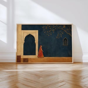May include: A rectangular framed wall art print featuring a dark blue background with a golden tree branch, a small arched window, and a large stone archway. A figure wearing a vibrant red garment walks across a tan floor in the foreground.