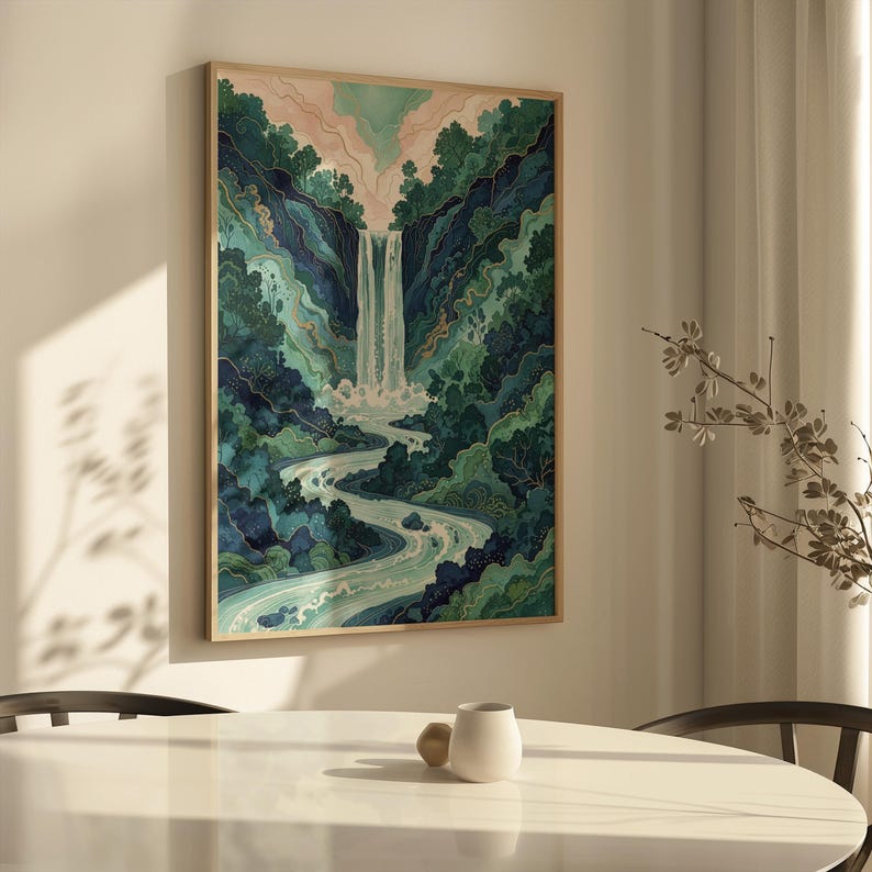 May include: A framed art print depicting a waterfall cascading down a lush, green mountain landscape. The artwork features shades of blue, green, and white, with a light pink sky. The print is in a natural wood frame.