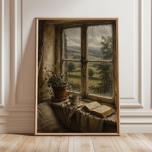 May include: A framed painting depicts a rainy day view through a window. A potted plant, a mug, and an open book rest on the windowsill. The window frames a green landscape with rolling hills and trees. The artwork is in warm, earthy tones.