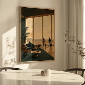 May include: A framed wall art print depicting a mid-century airport lounge scene with large windows, silhouettes of three people with luggage, a brown lounge chair, a round side table with a lamp, and a potted plant against a warm sunset sky.