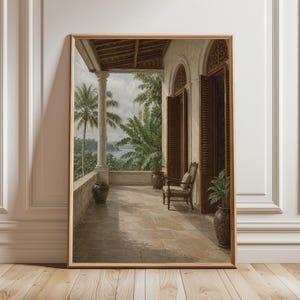 May include: Framed vintage print depicting a veranda with a tropical view. The artwork shows a stone patio, a wooden chair, and abundant greenery. The scene is enclosed by a wooden frame, offering a classic aesthetic.