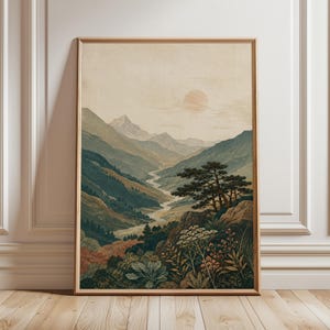 May include: A framed vertical wall art print depicting a mountain valley landscape with a winding river, a pale sun in the sky, and a foreground filled with detailed botanical illustrations of wildflowers, shrubs, and a prominent pine tree.