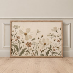 May include: A rectangular wall art print in a light wood frame featuring a botanical illustration of wildflowers in muted tones of cream, beige, and sage green. The artwork depicts various cosmos flowers, delicate stems, and small buds.