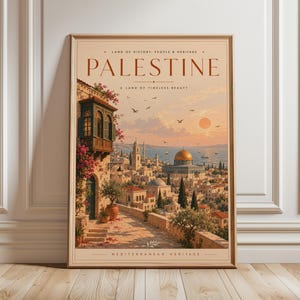 May include: A framed vertical poster titled PALESTINE, featuring a warm-toned illustration of a coastal city with stone buildings, a golden dome, and a balcony with pink flowers. The text reads LAND OF HISTORY, PEOPLE & HERITAGE and MEDITERRANEAN HERITAGE.