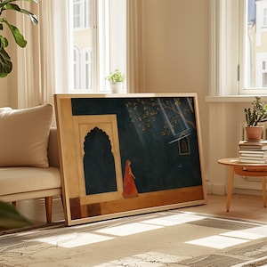 May include: A rectangular framed wall art print featuring a dark teal background with a golden archway, a person in a vibrant orange garment walking, and a tree with golden leaves. The artwork is displayed in a light-coloured wooden frame.