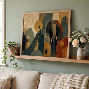 May include: A rectangular framed wall art print featuring a stylized illustration of a peacock and an elephant. The artwork uses a palette of deep blue, gold, terracotta, and muted green tones, depicting architectural elements and organic shapes.