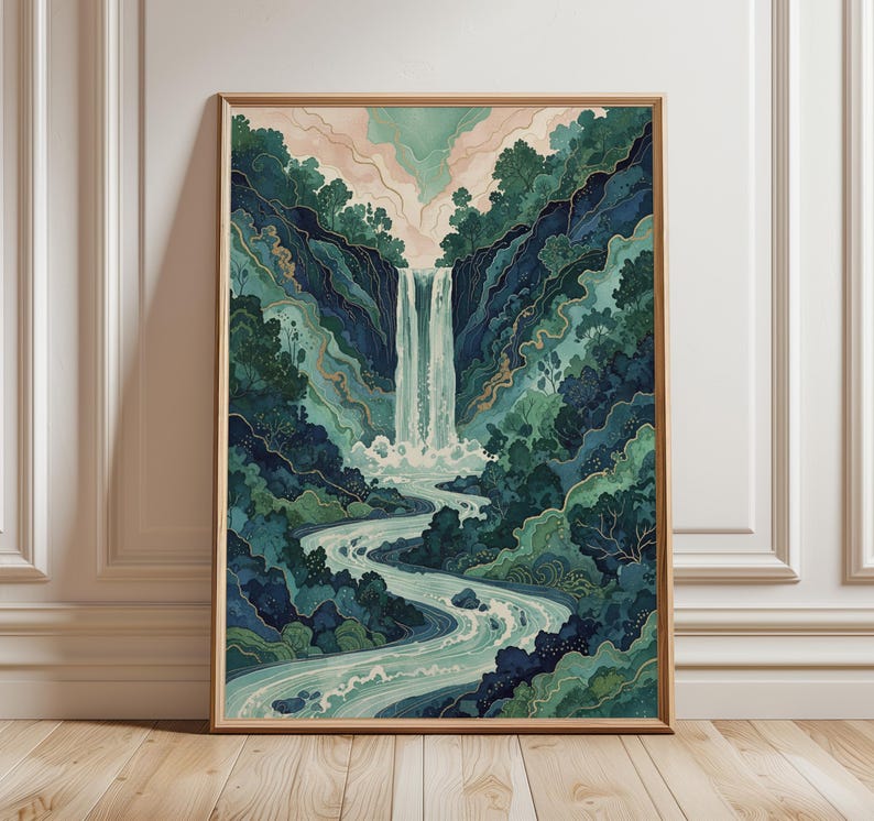 May include: A framed art print featuring a watercolor illustration of a waterfall cascading into a river. The artwork uses shades of blue and green to depict the lush forest and flowing water. The frame is a light brown color.
