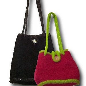 May include: Two crocheted handbags, one black and one red with a green trim.