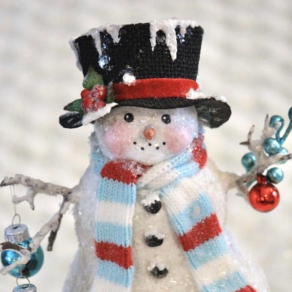 Zelfstudie voor het maken van een sneeuwpop van papierklei