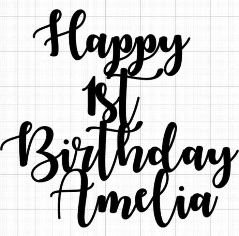 May include: Black cursive text on a white grid background reads "Happy 1st Birthday Amelia." The words are layered, with "Happy" at the top, "1st" in the middle, and "Birthday Amelia" at the bottom.
