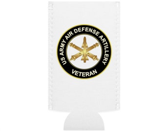 May include: White can cooler with a black and gold circle emblem. The emblem says "US Army Air Defense Artillery Veteran".