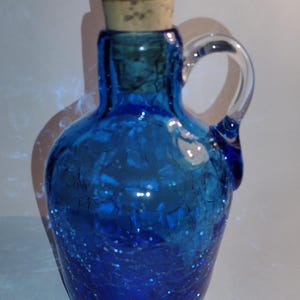 Vintage Hand-Blown Cobalt Blue Crackle Glass Jug W/ Applied Clear Handle and Cork