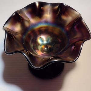 Northwood Daisy and Plume Amethyst Carnival Glass Ruffle Compote, circa 1930s.