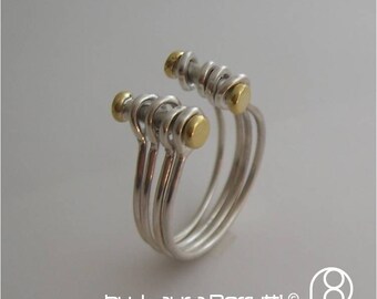 Sterling Silver and 14K gold Ring made of multiple rings