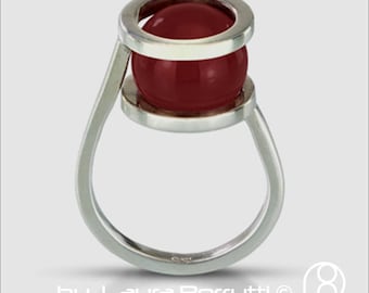 Sterling Ring with Carnelian hold by Two Rings