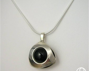 Sterling Silver Kinetic Pendant with Onyx Sphere in tension