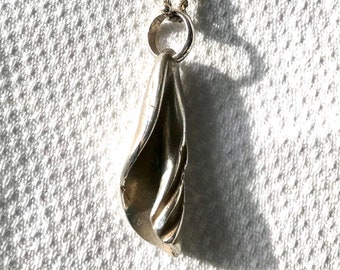 Kiri twirling dancer sterling silver worn shell beach boho ocean pendant