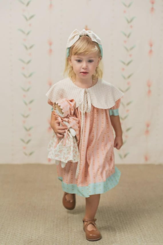 open lace back dress A-line cotton dress with ruffled shoulders and a dreamy pastel floral main image 1