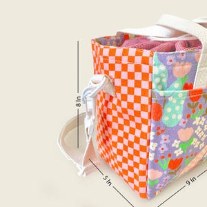 Side view of Mapayah floral kids’ tote bag showing 9x5x8 inch dimensions and adjustable strap.