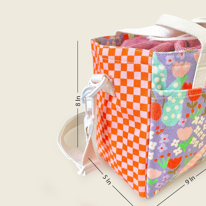 Side view of Mapayah floral kids’ tote bag showing 9x5x8 inch dimensions and adjustable strap.