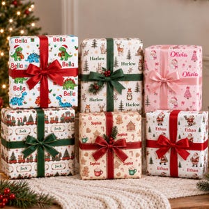 May include: Six rectangular gift boxes wrapped in patterned paper, each tied with a satin ribbon and personalised with names including Bella, Harlow, Olivia, Jack, Sophia, and Ethan. The designs feature dinosaurs, forest animals, Santa Claus, trains, and holiday treats.
