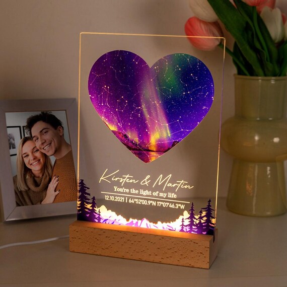 A glowing 3D night light that renders the exact star map of a meaningful date — way more interesting than a flat print.