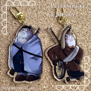 May include: Two acrylic keychains with cartoon character designs. One character is in a blue coat, the other in a brown uniform, both with gold clasps. The text "Peternosuke & Joesily" is visible, along with "(Ignore the glare)".