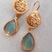 see more listings in the Gold Dangle Earrings section