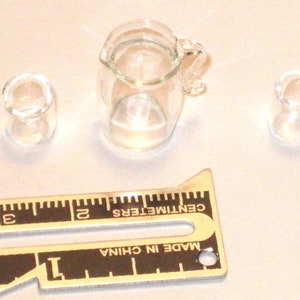 Antique miniature hand blown pitcher & 2 glass mugs