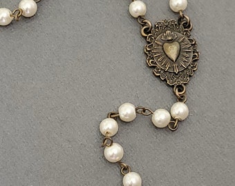 Milagros Ex Voto Faux Cream Pearl Sacred Heart Rosary Style Lariat Y Necklace Flaming Heart Love Jewelry  Milagro Antique Gold- Bronze