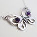 see more listings in the Modern Silver Necklaces section