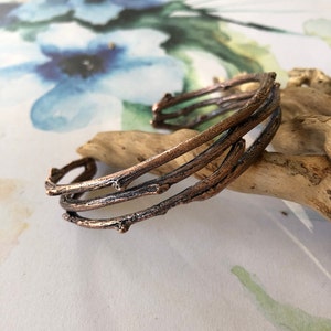 I collected twigs , cast them in metal and formed them to make this twig cuff bracelet. This copper bracelet is carefully finished to look natural. It’s the perfect unisex gift for a nature lover.  It is available in large and small sizes.