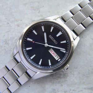 Seiko SUR341P1 Blue Dial Steel Men&#39;s Quartz Bracelet Watch Day Date
