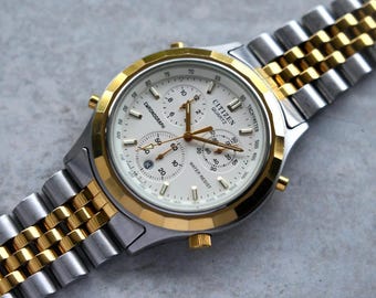 Diciembre de 1989. Reloj Citizen de cuarzo bicolor con brazalete Jubilee de oro y esfera blanca.
